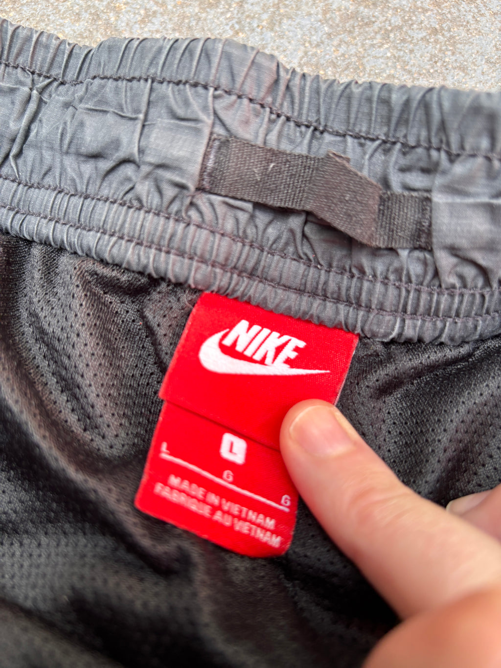 Nike Track Pants Women’s Size L Black Hip Logo Tapered Button Zip Drawstring