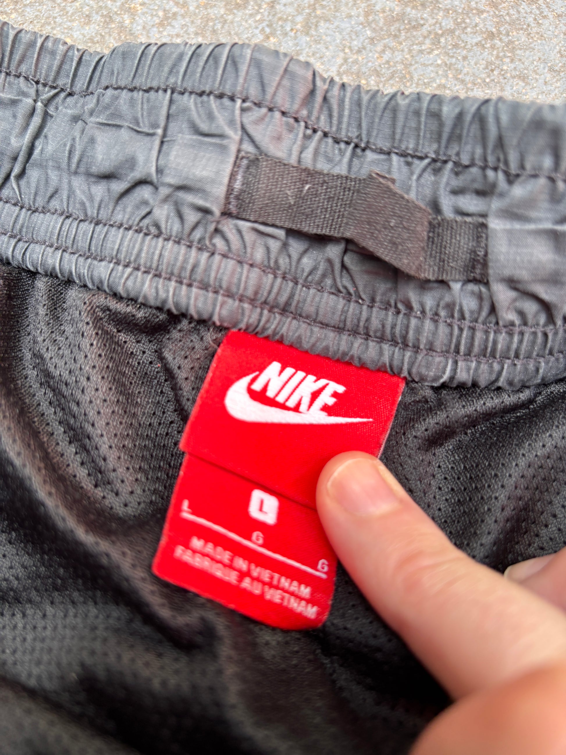 Nike Track Pants Women’s Size L Black Hip Logo Tapered Button Zip Drawstring