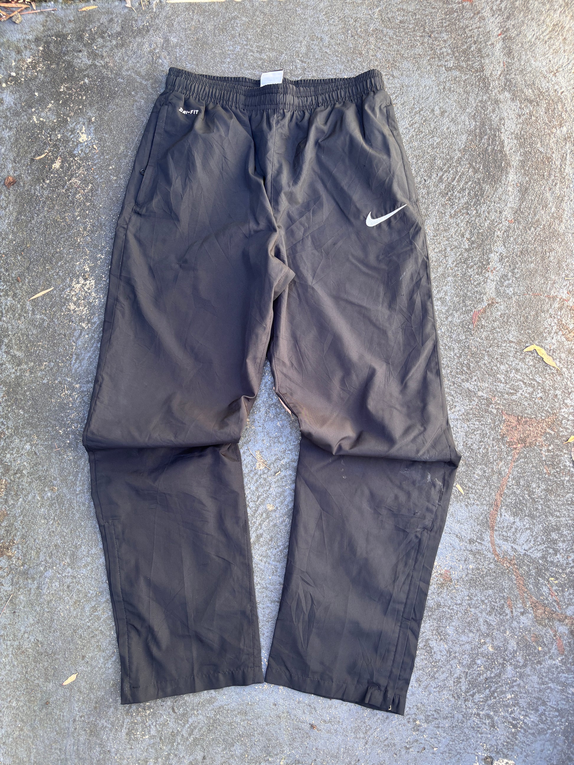 Nike Dri-Fit Track Pants Size S Black White Swoosh Straight Leg Ankle Zip
