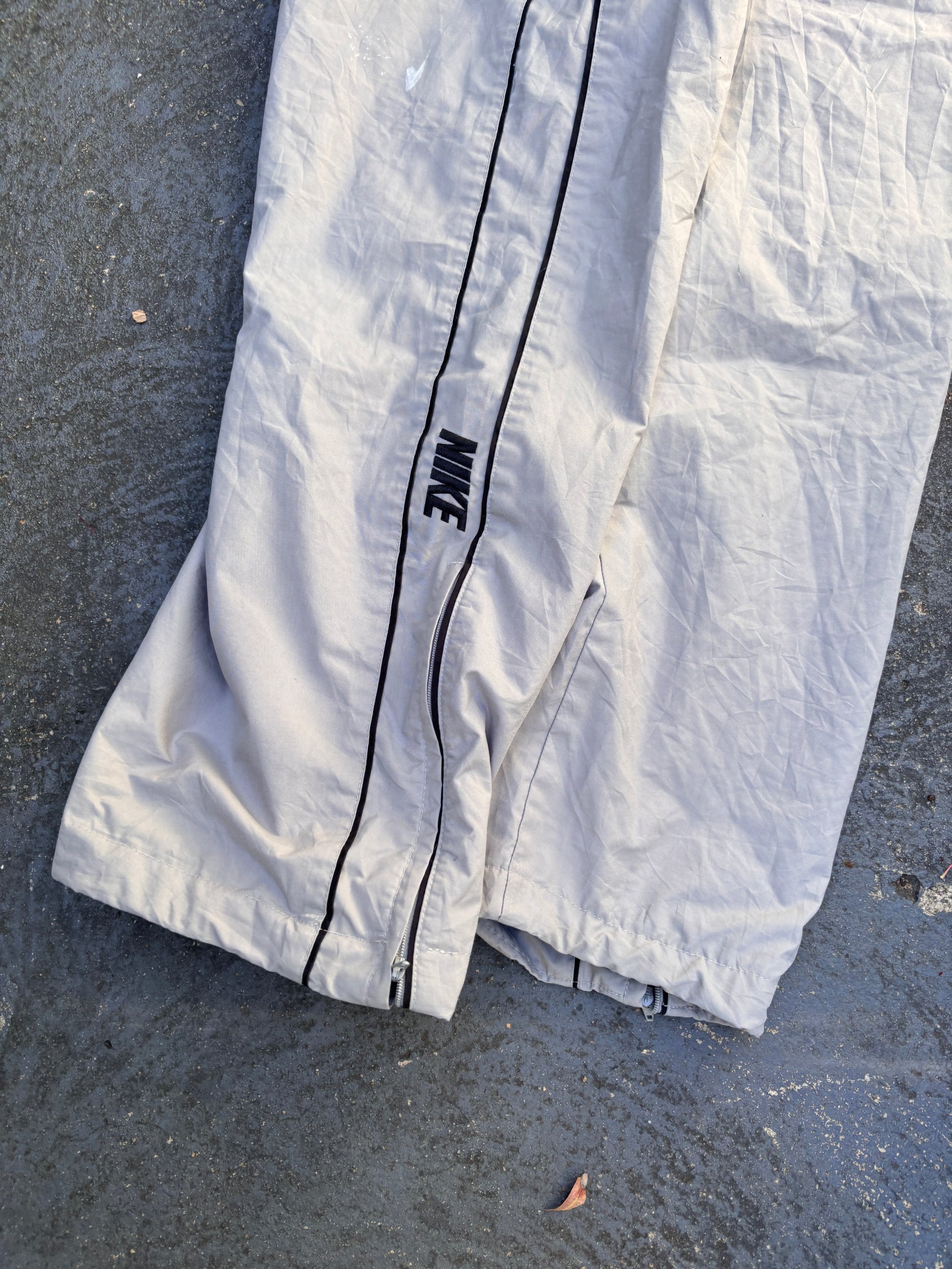 Vintage Y2K Nike Track Pants Size XL Grey Black Piping Spell Out Wide Leg Ankle Zip