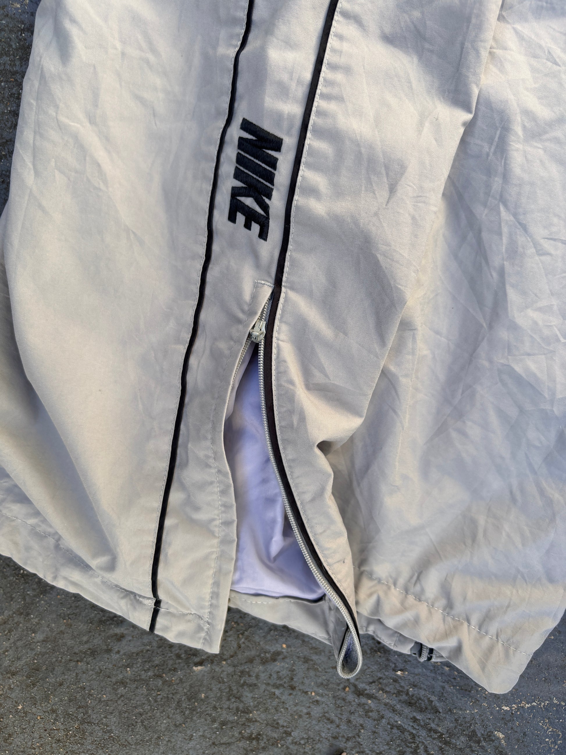 Vintage Y2K Nike Track Pants Size XL Grey Black Piping Spell Out Wide Leg Ankle Zip