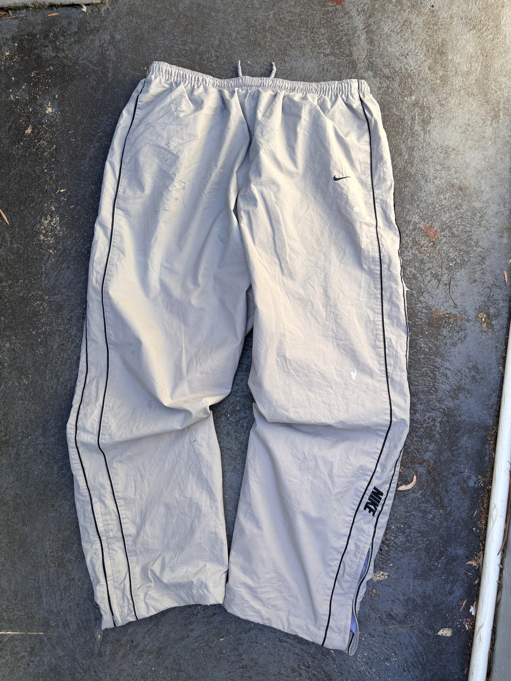 Vintage Y2K Nike Track Pants Size XL Grey Black Piping Spell Out Wide Leg Ankle Zip