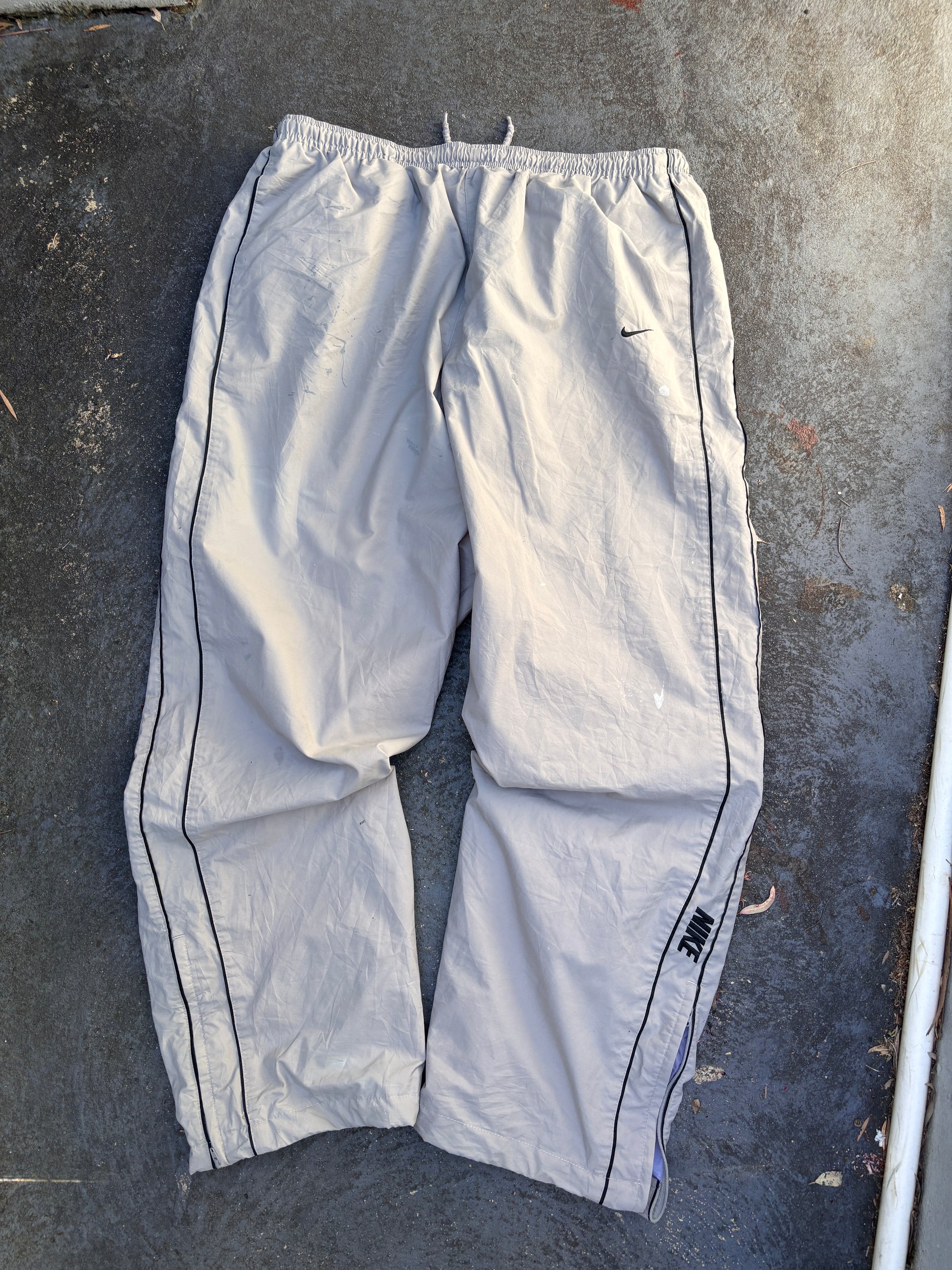 Vintage Y2K Nike Track Pants Size XL Grey Black Piping Spell Out Wide Leg Ankle Zip