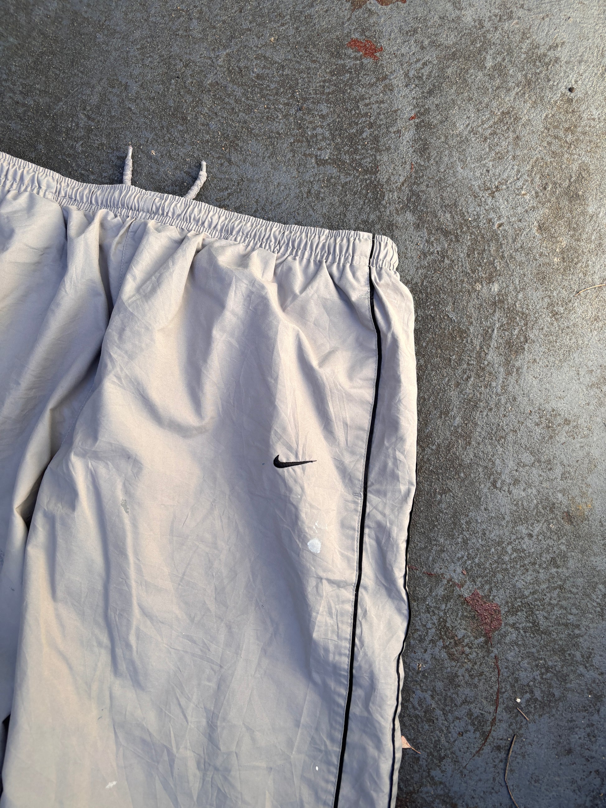 Vintage Y2K Nike Track Pants Size XL Grey Black Piping Spell Out Wide Leg Ankle Zip