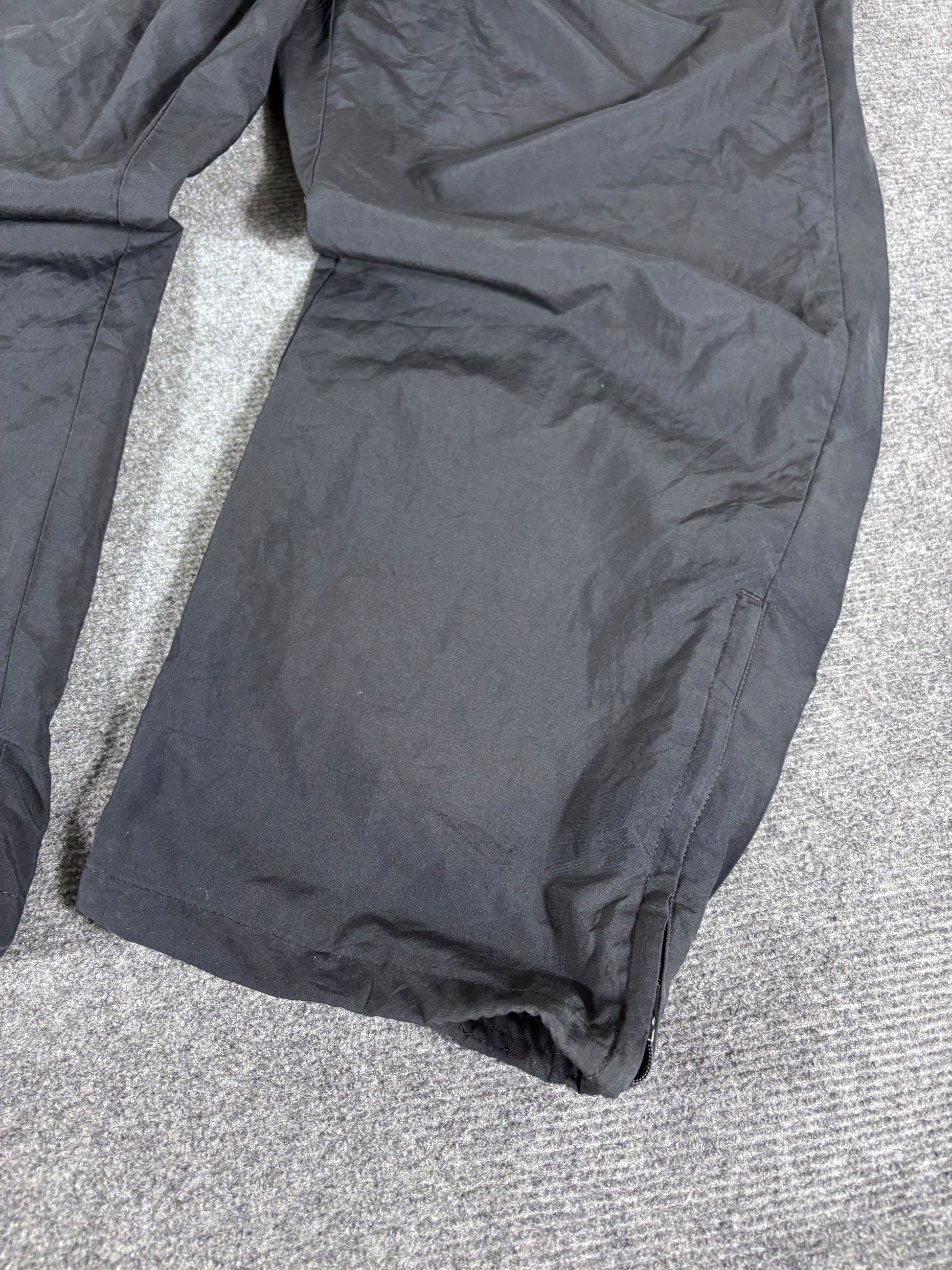 Vintage Late Y2K / 10s Nike Track Pants Size L Black White Swoosh Wide Leg Ankle Zip