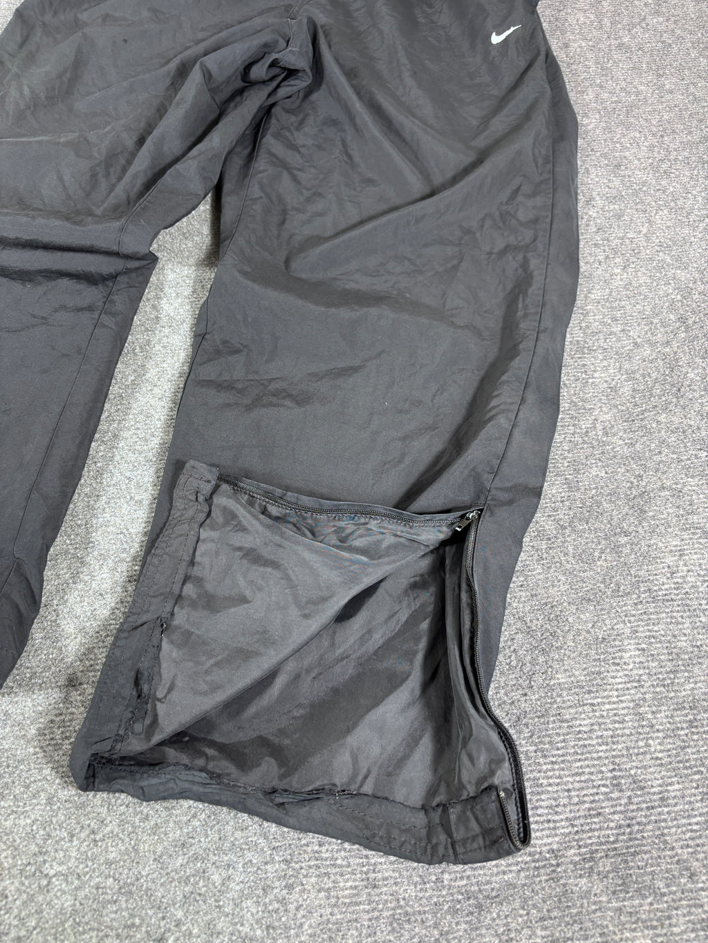 Vintage Late Y2K / 10s Nike Track Pants Size L Black White Swoosh Wide Leg Ankle Zip