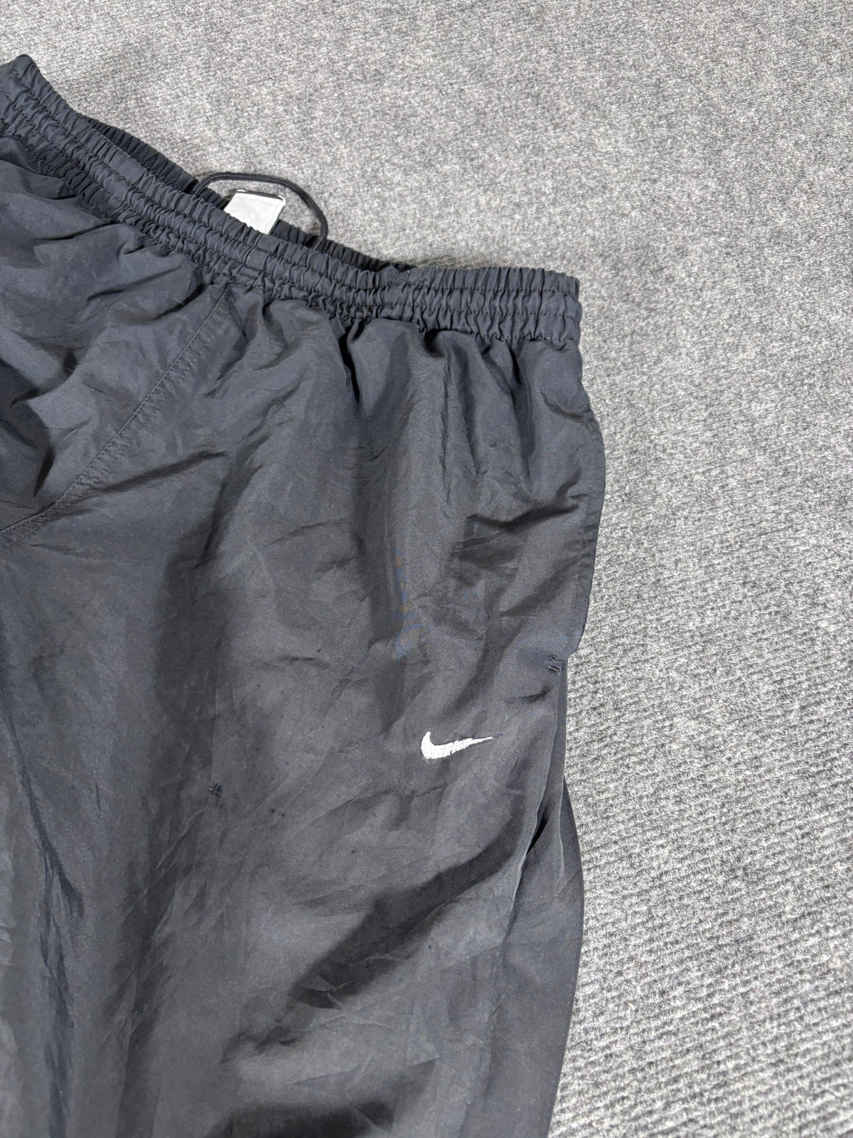 Vintage Late Y2K / 10s Nike Track Pants Size L Black White Swoosh Wide Leg Ankle Zip
