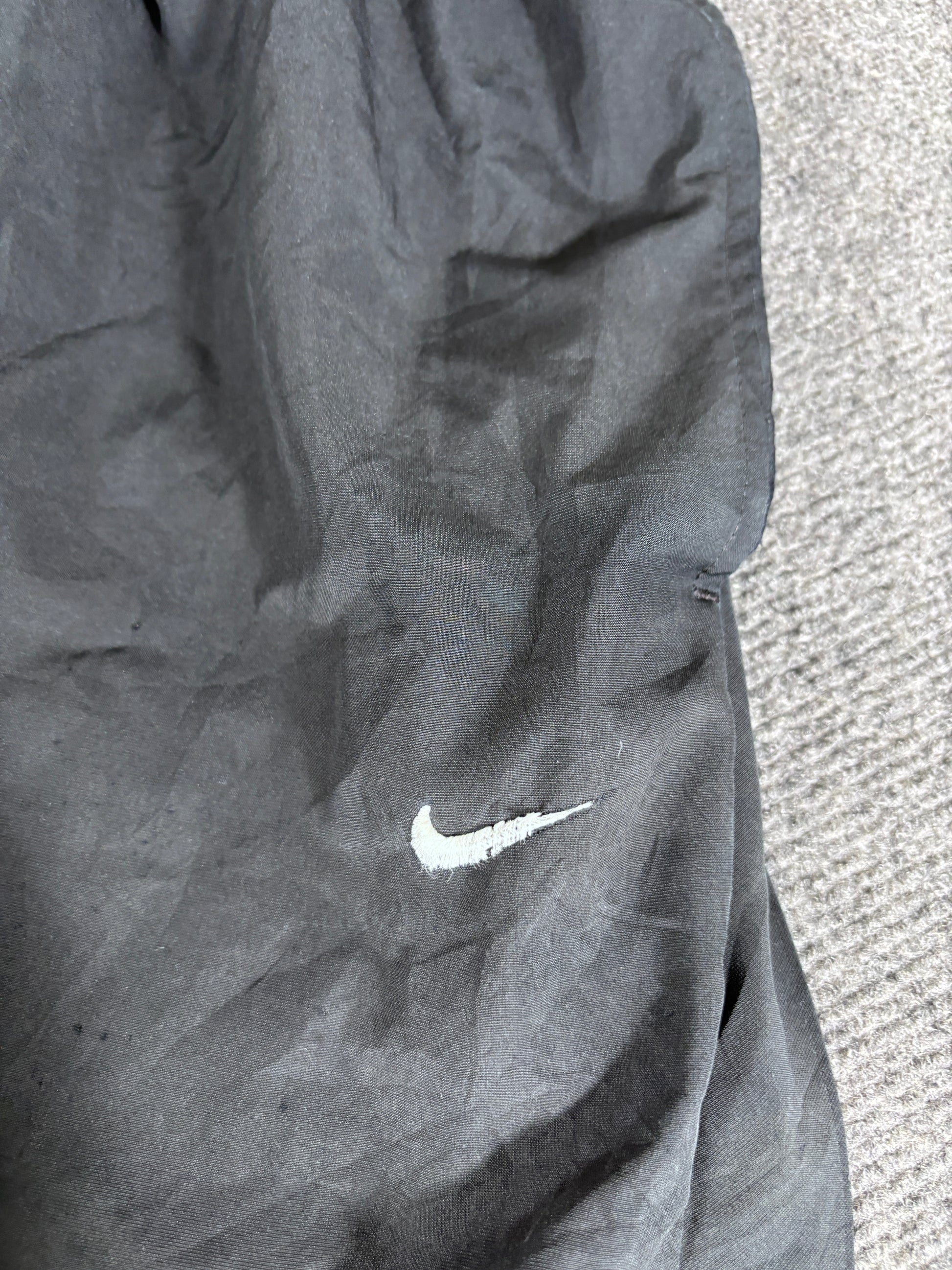 Vintage Late Y2K / 10s Nike Track Pants Size L Black White Swoosh Wide Leg Ankle Zip