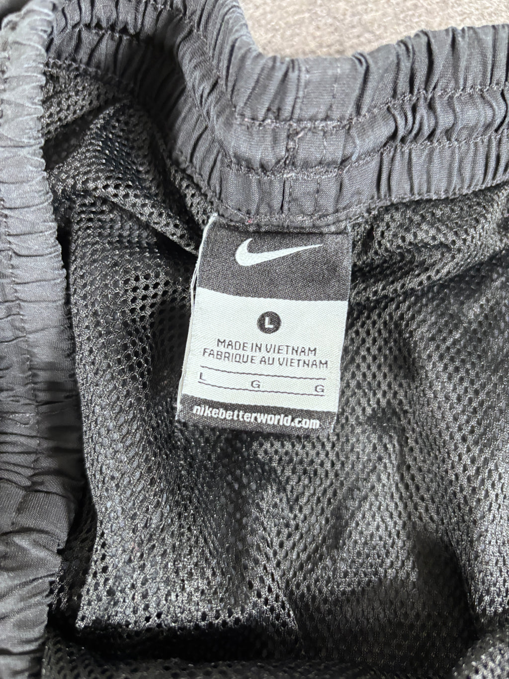 Vintage Late Y2K / 10s Nike Track Pants Size L Black White Swoosh Wide Leg Ankle Zip