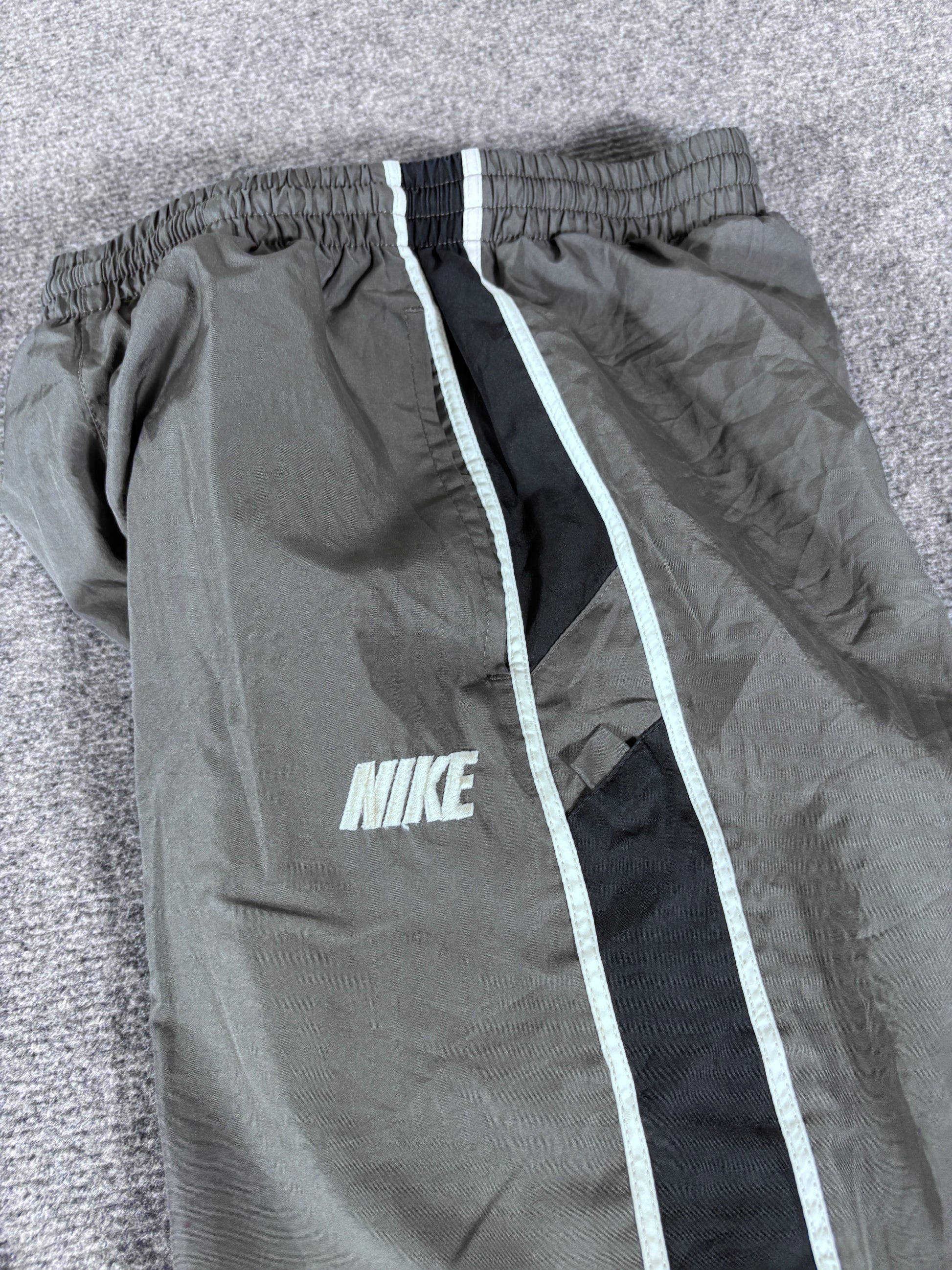 Vintage Nike 3/4 Track Pants Size XS Grey Black Spell Out Side Detail Windbreakers