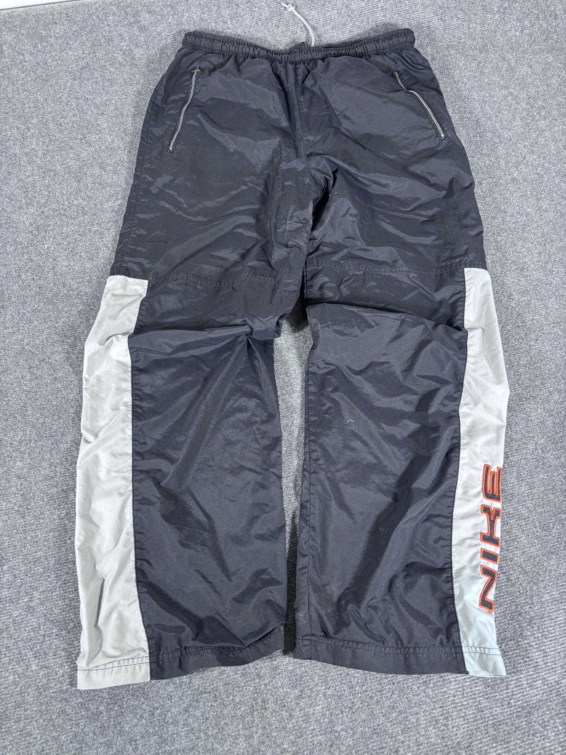 Vintage Y2K Nike Track Pants Size L Black Grey Orange Spell Out Wide Leg Ankle Zip