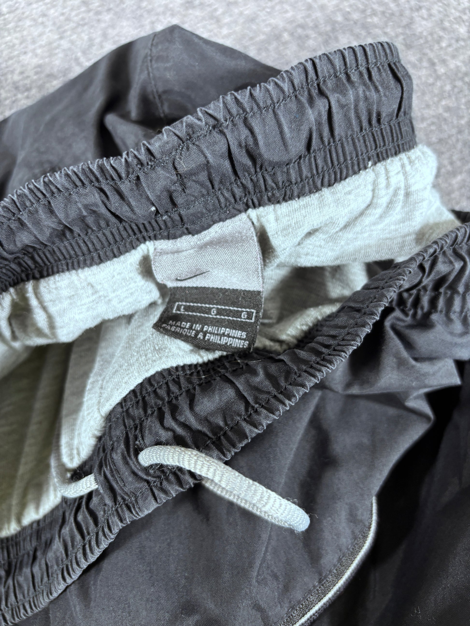 Vintage Y2K Nike Track Pants Size L Black Grey Orange Spell Out Wide Leg Ankle Zip