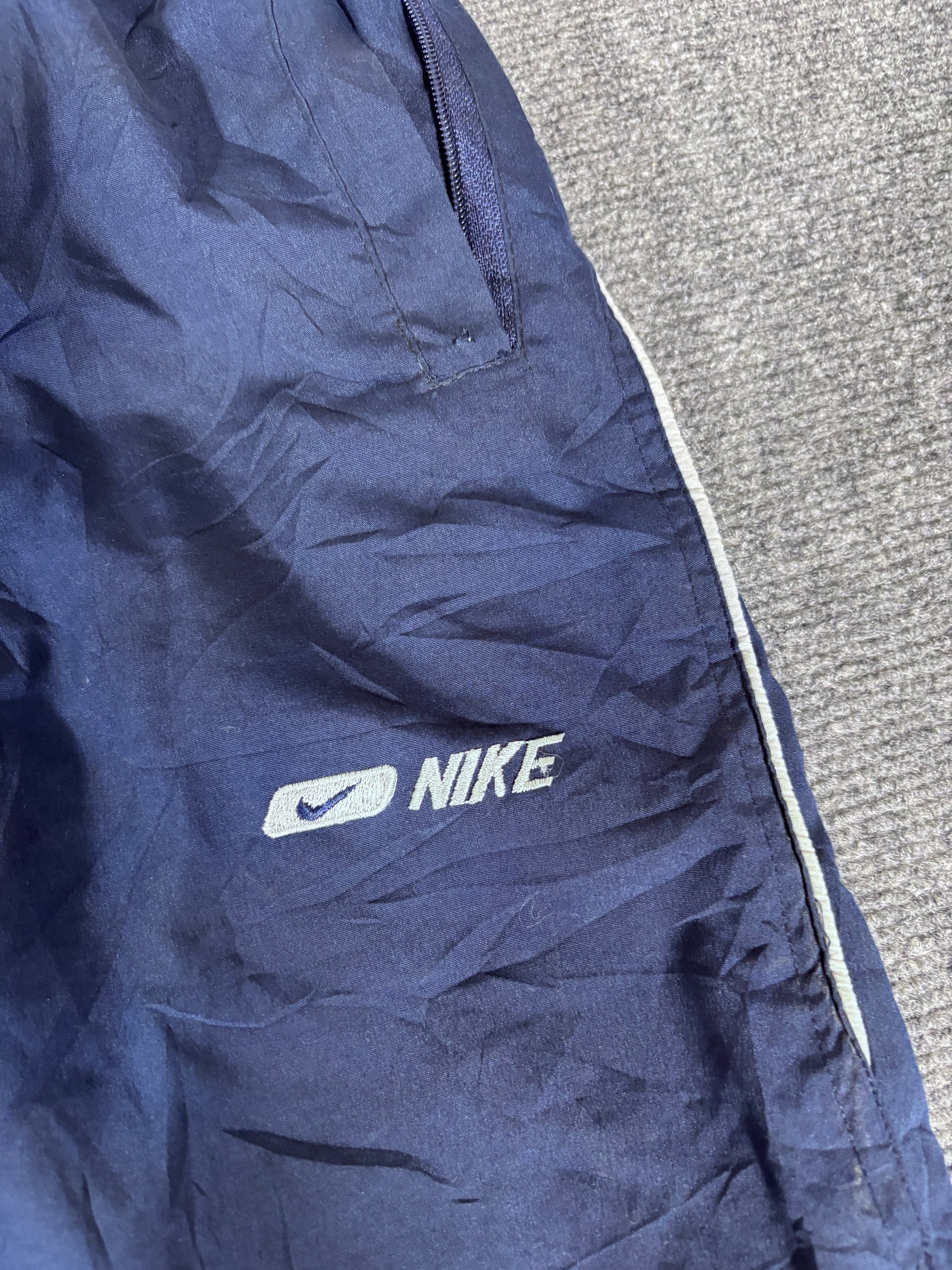 Vintage 90s Nike Track Pants Size XL Navy Badge Swoosh Spell Out Wide Leg Ankle Zip