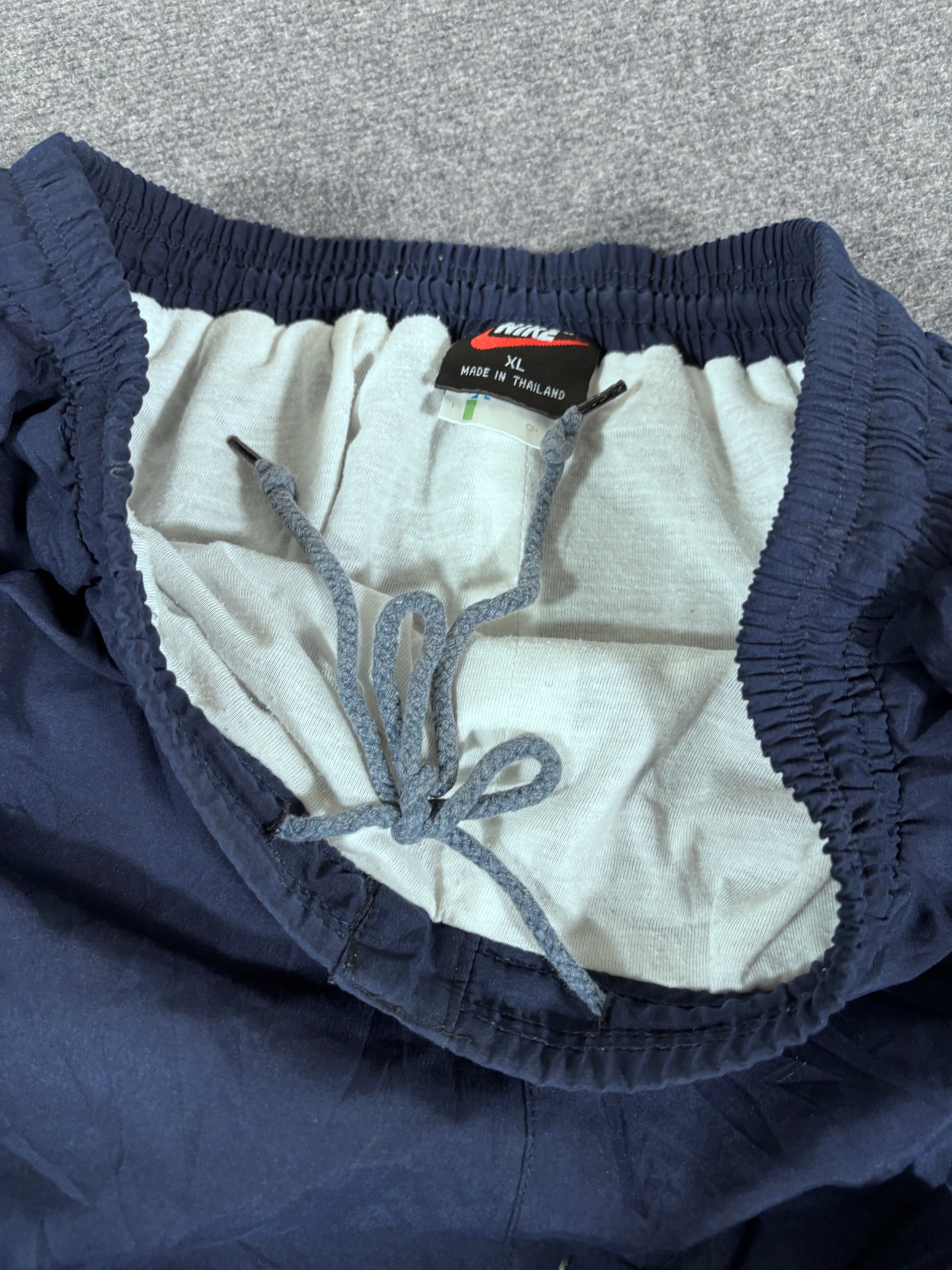 Vintage 90s Nike Track Pants Size XL Navy Badge Swoosh Spell Out Wide Leg Ankle Zip