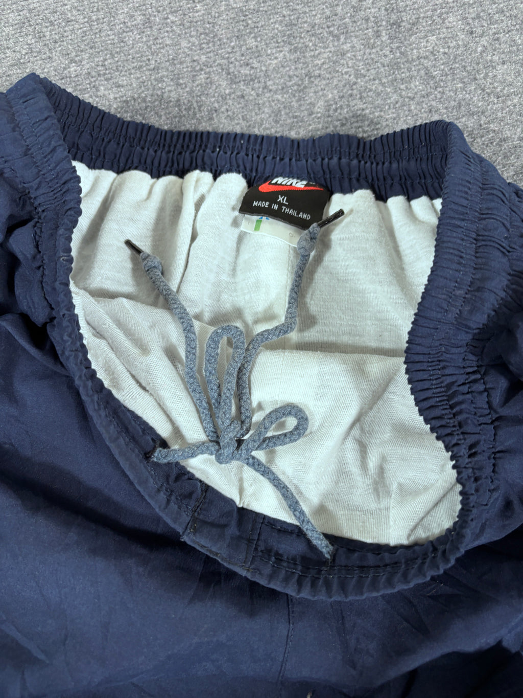 Vintage 90s Nike Track Pants Size XL Navy Badge Swoosh Spell Out Wide Leg Ankle Zip