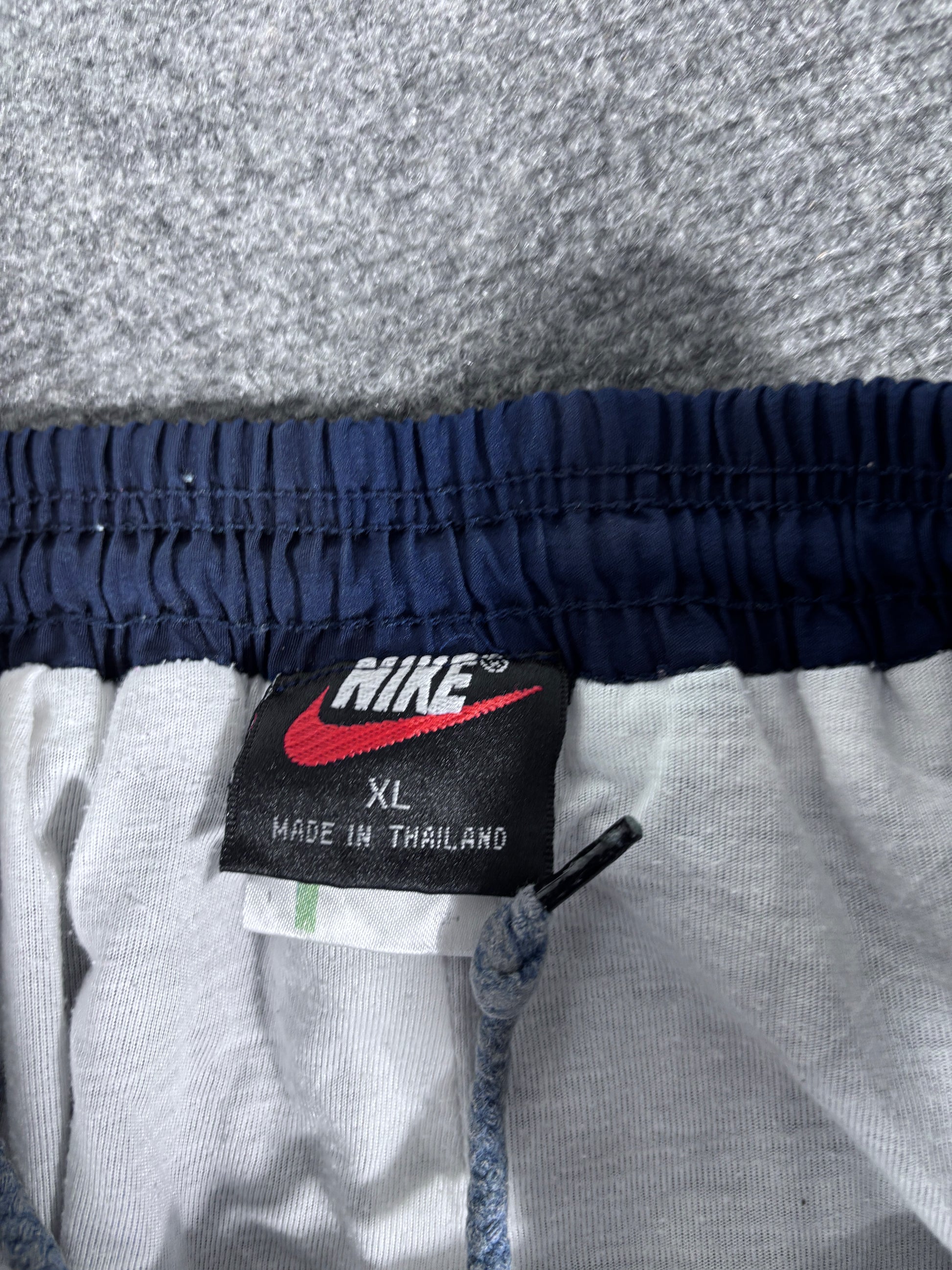 Vintage 90s Nike Track Pants Size XL Navy Badge Swoosh Spell Out Wide Leg Ankle Zip