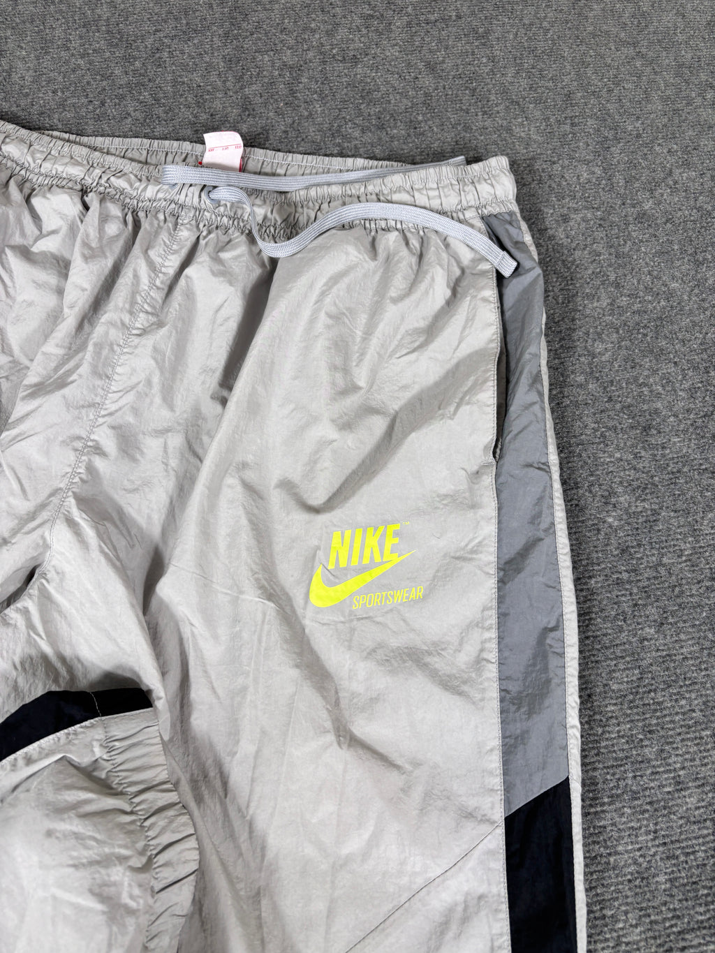 Vintage Y2K Nike Track Pants Size XL Grey Black Detail Fluro Hip Logo Cuffed Ankle