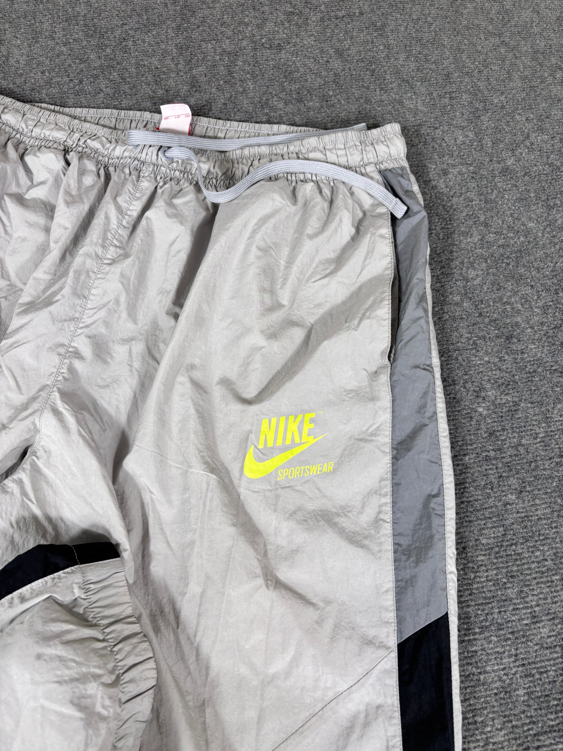 Vintage Y2K Nike Track Pants Size XL Grey Black Detail Fluro Hip Logo Cuffed Ankle