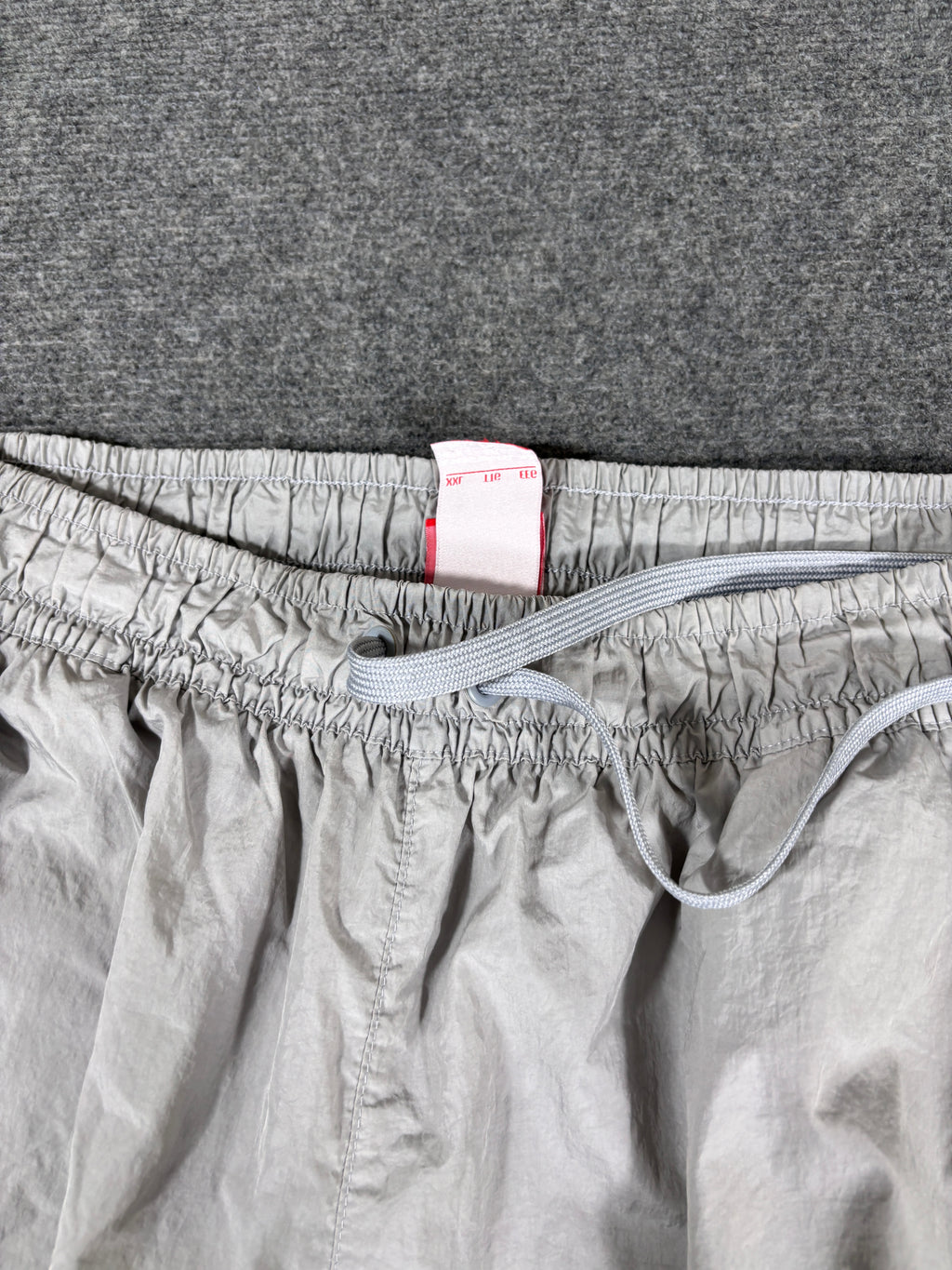 Vintage Y2K Nike Track Pants Size XL Grey Black Detail Fluro Hip Logo Cuffed Ankle