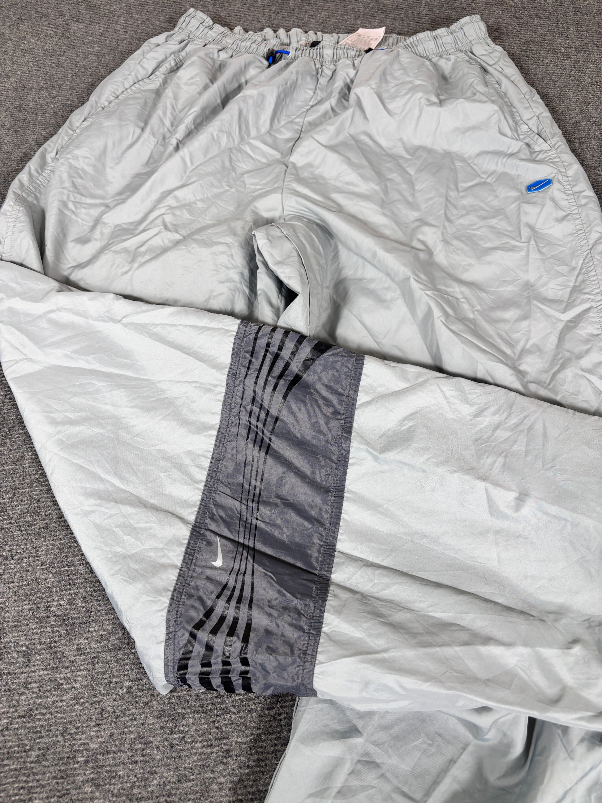 Vintage Y2K Nike Track Pants Size XL Grey Blue Hex Logo Bungee Ankle Zip Wide Leg
