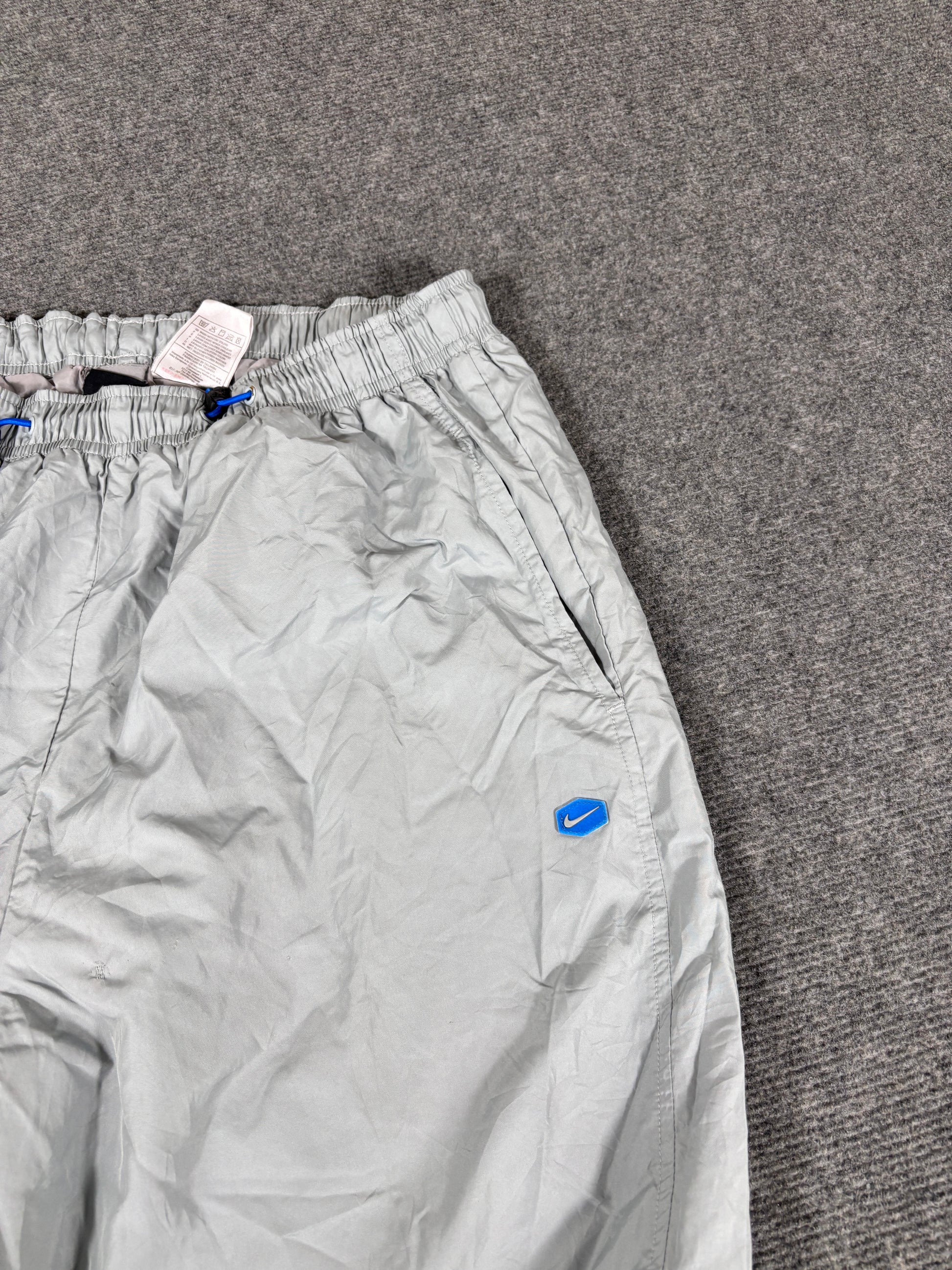 Vintage Y2K Nike Track Pants Size XL Grey Blue Hex Logo Bungee Ankle Zip Wide Leg