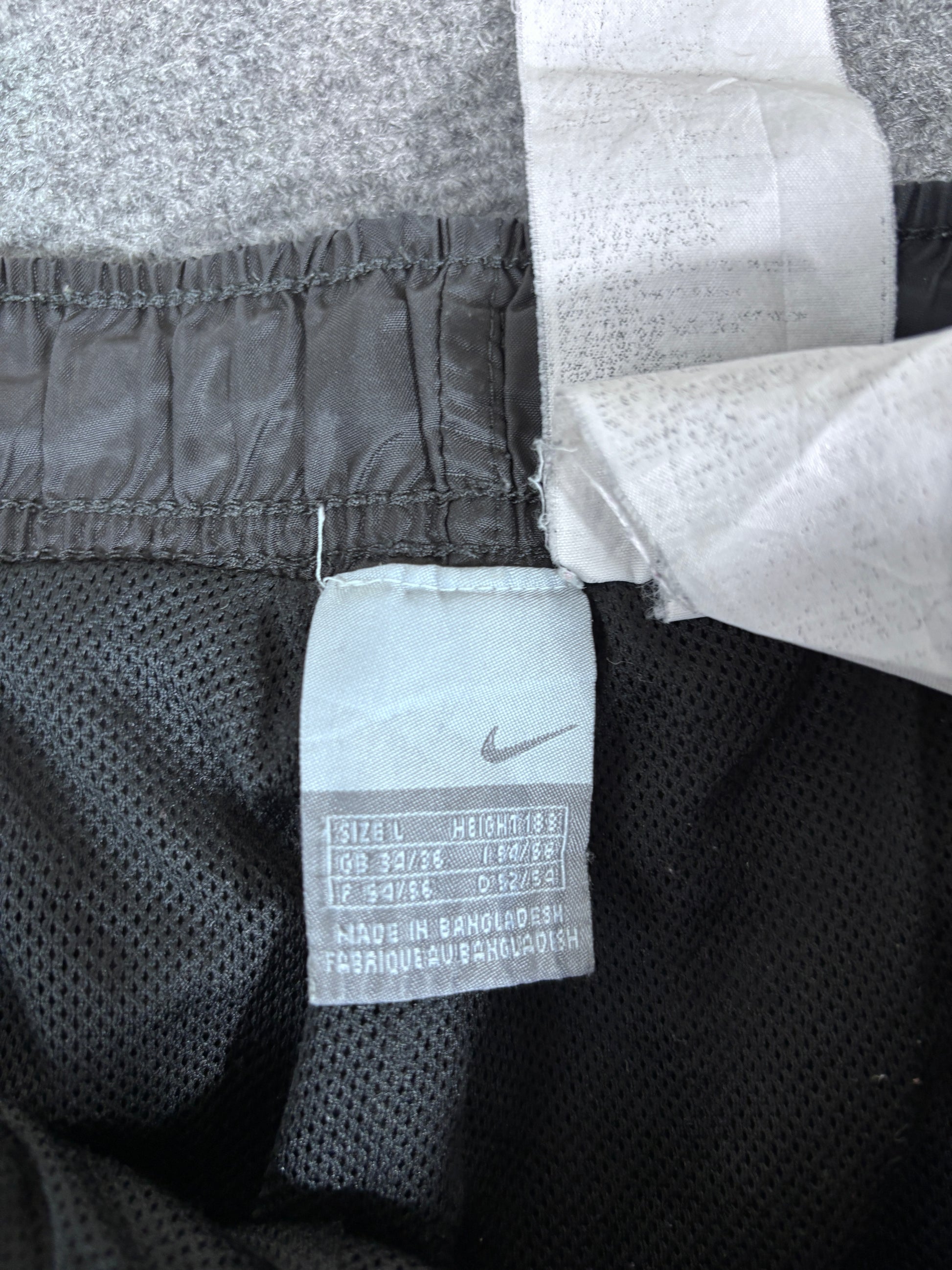 Vintage Y2K Nike Track Pants Size L Black White Wide Leg Ankle Zip Swoosh Windbreakers