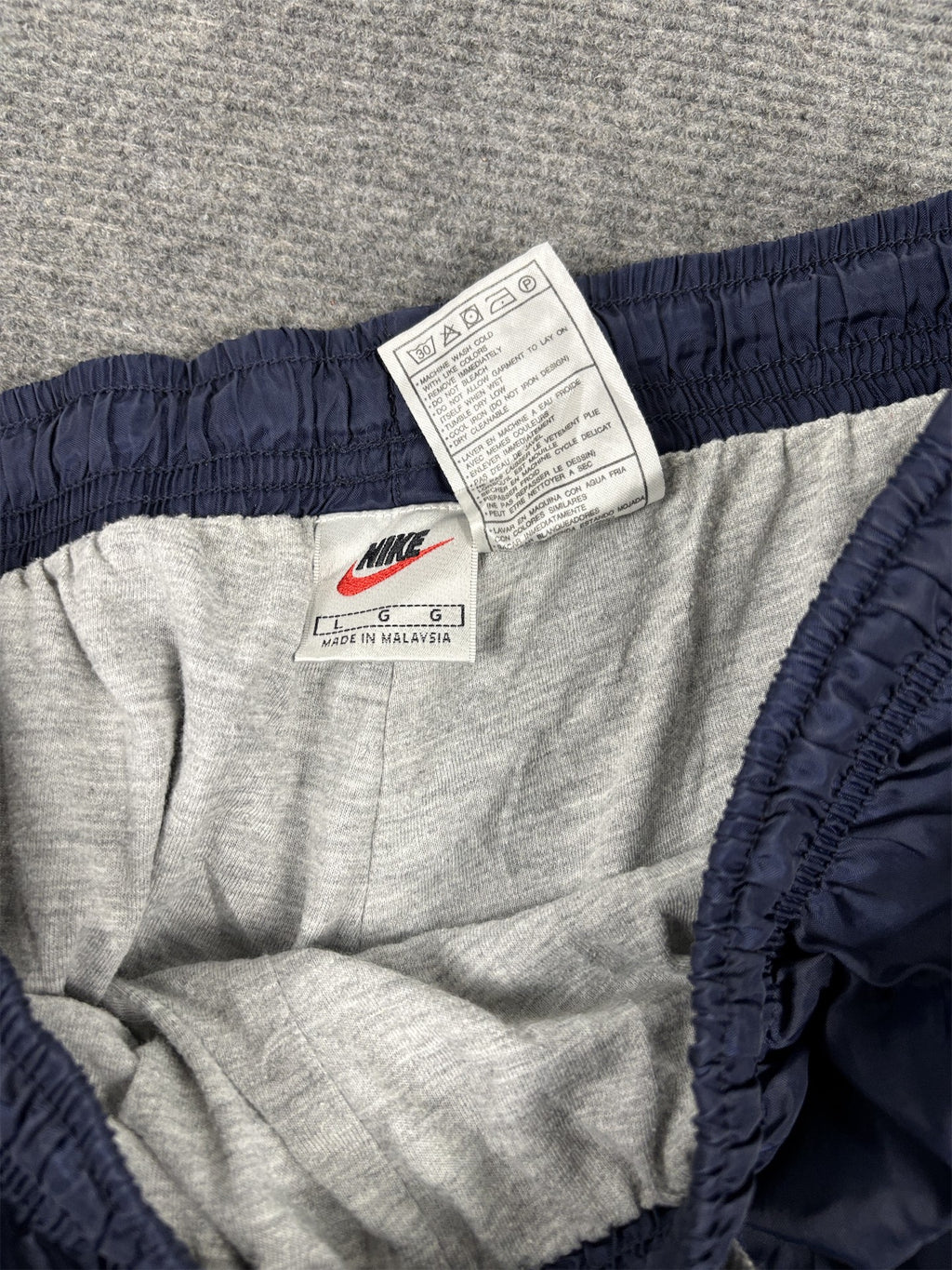 Vintage 90's Nike Track Pants Men's L Navy Blue White Piping Cuffed Joggers