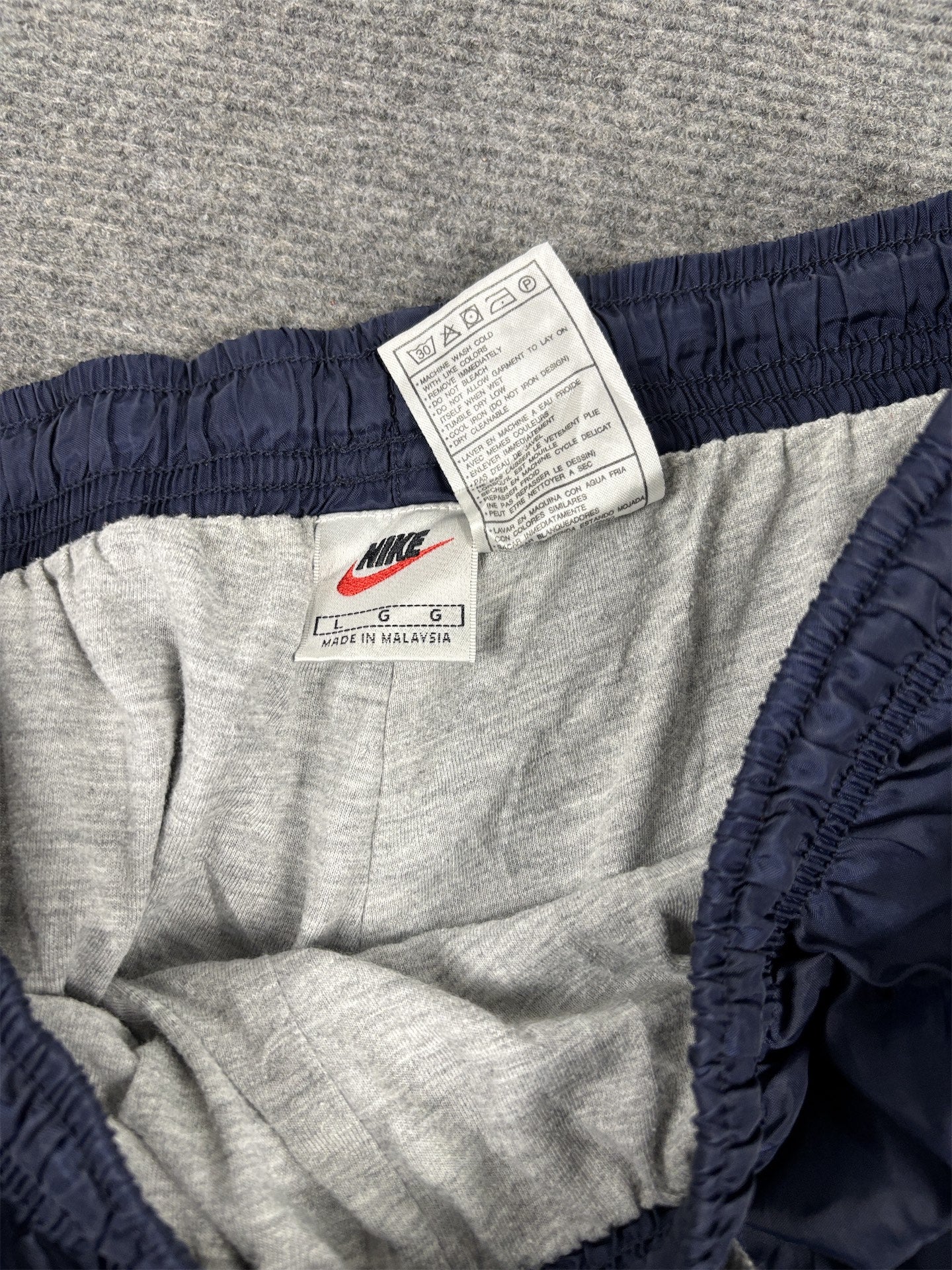 Vintage 90's Nike Track Pants Men's L Navy Blue White Piping Cuffed Joggers
