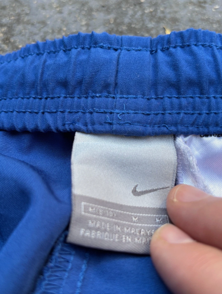 Vintage Y2K Nike Track Pants Women’s Size M Two-Tone Blue Wide Leg Ankle Slit Swoosh