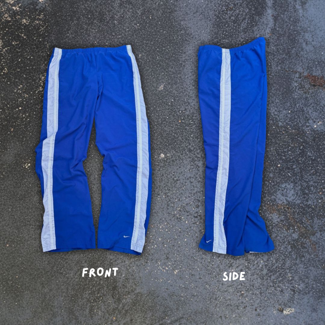 Vintage Y2K Nike Track Pants Women’s Size M Two-Tone Blue Wide Leg Ankle Slit Swoosh