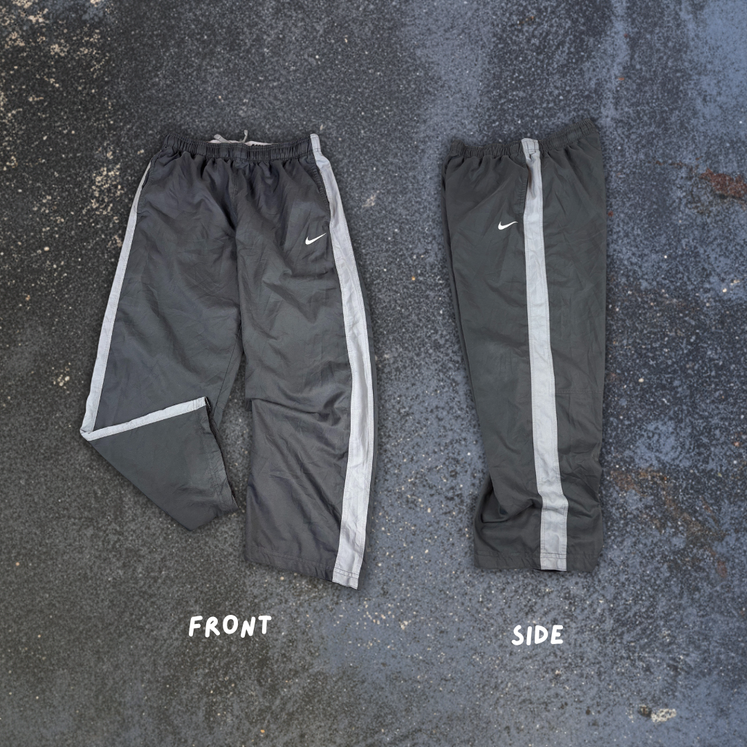 Nike Dri-Fit Track Pants L Black Printed Grey Swoosh Side Panels Baggy Fit