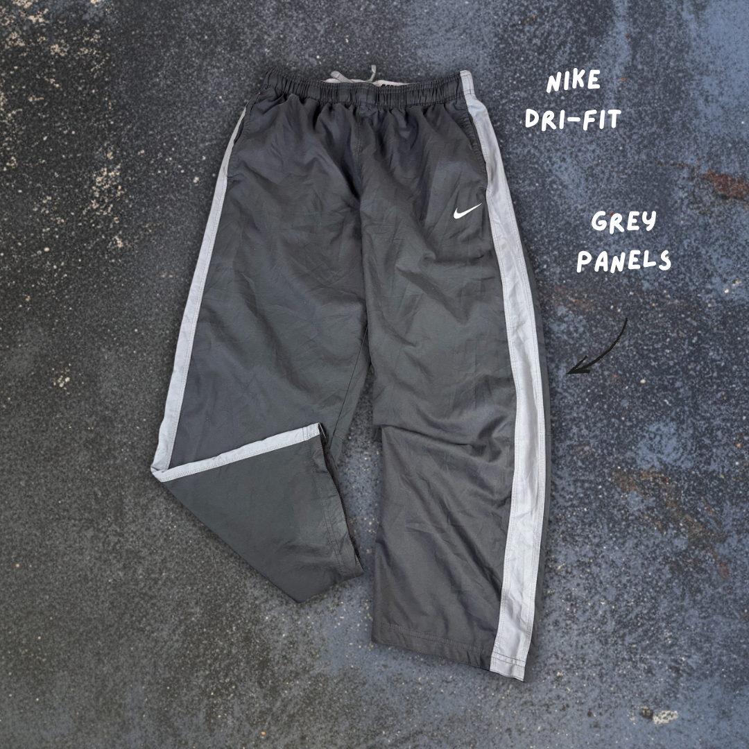 Nike Dri-Fit Track Pants L Black Printed Grey Swoosh Side Panels Baggy Fit