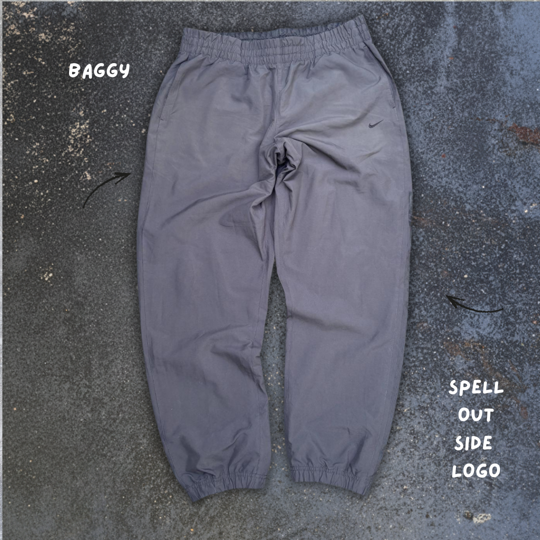 Vintage Y2K Nike Track Pants Tagged XXL Grey Black Detail Spell Out Windbreakers