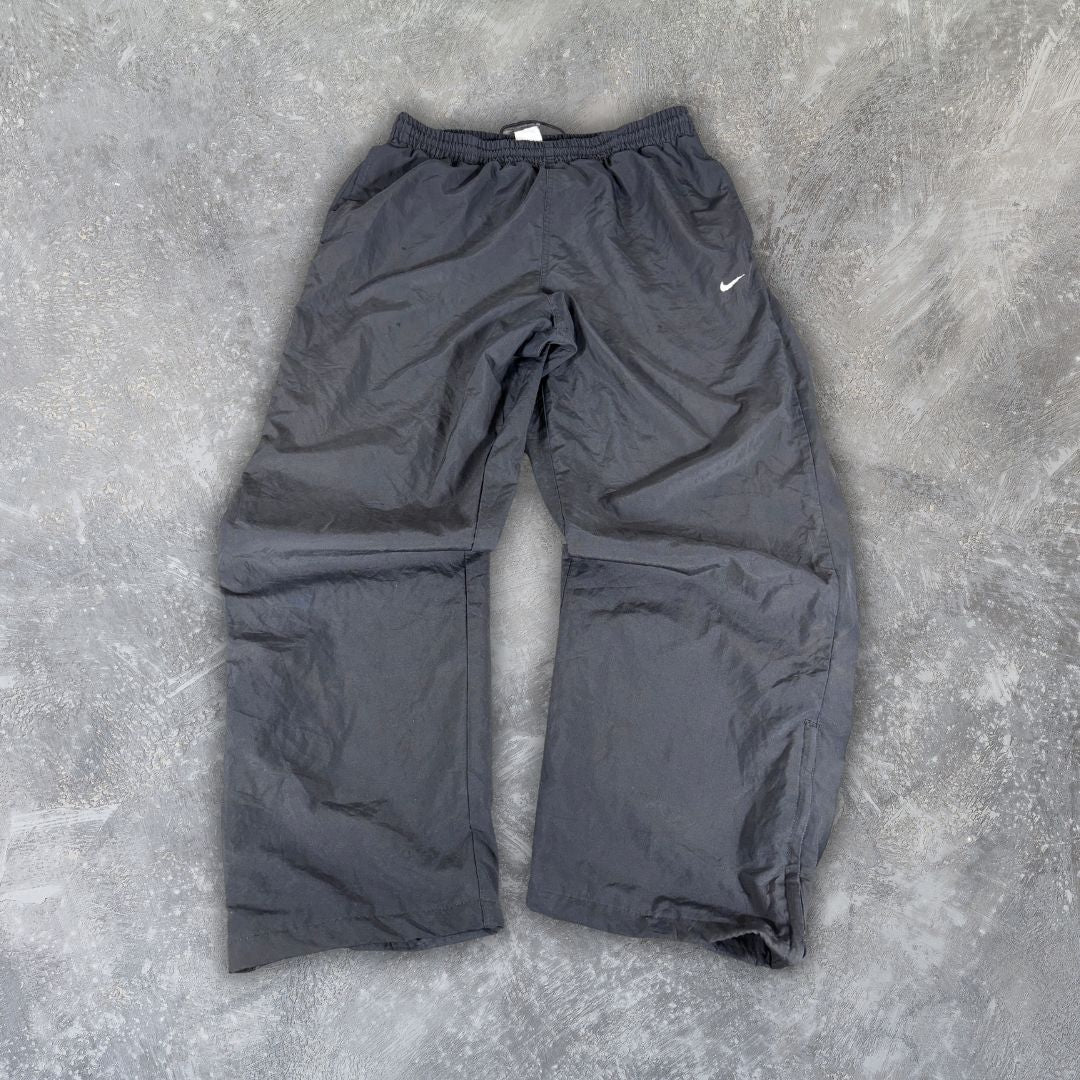 Vintage Late Y2K / 10s Nike Track Pants Size L Black White Swoosh Wide Leg Ankle Zip