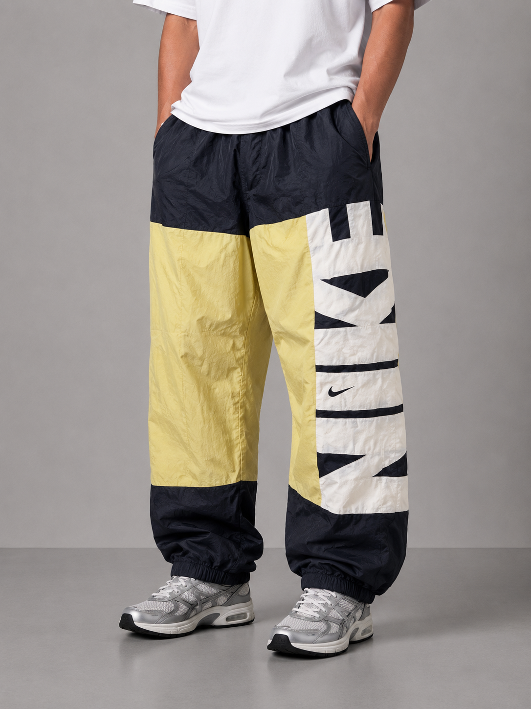 Y2K Nike Track Pants Men's L Black Yellow White Spell Out Joggers
